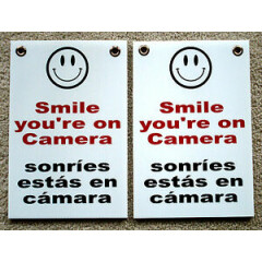 2 SMILE YOU'RE ON CAMERA SIGNS 8"x12" w/ Grommets Security Surveillance Spanish