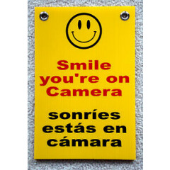 SMILE YOU'RE ON CAMERA SIGN 8"x12" w/ Grommets Security Surveillance Spanish