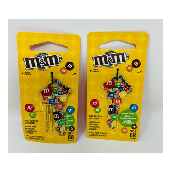 Hillman # 68 M&M Multicolored with Characters Blank House Key 87533 - Lot of 2 image {1}