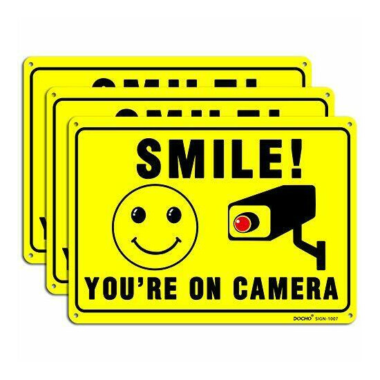 DOCHO Smile You are on Camera Video Surveillance Sign, 3 Pack 10"x 7" Rust Free  image {1}