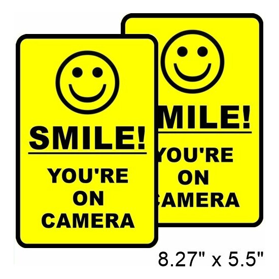 2 Home Business SMILE YOU'RE ON CAMERA Window Door Warning Vinyl Sticker Decal image {1}