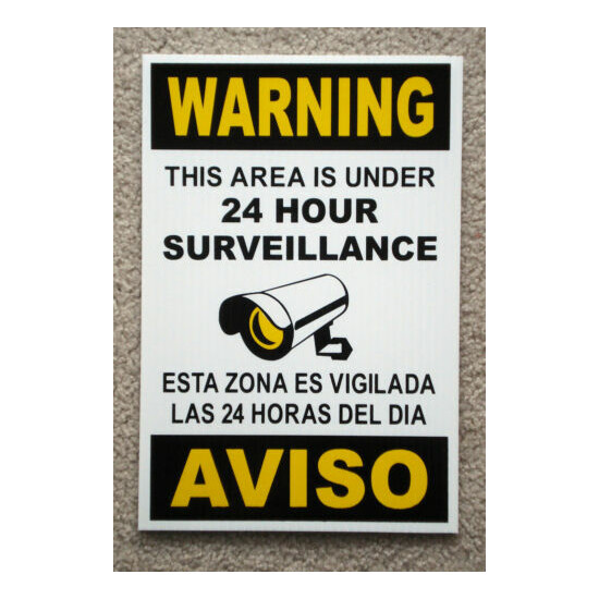 Security Video Surveillance Warning 24 Hr Coroplast Sign 8x12 Spanish English image {1}
