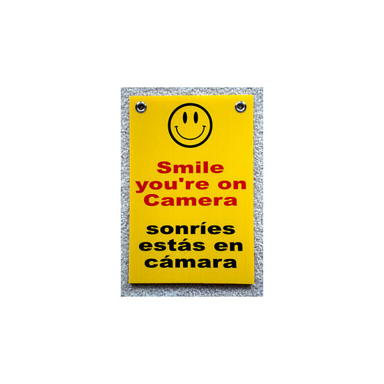 SMILE YOU'RE ON CAMERA SIGN 8"x12" w/ Grommets Security Surveillance Spanish image {1}